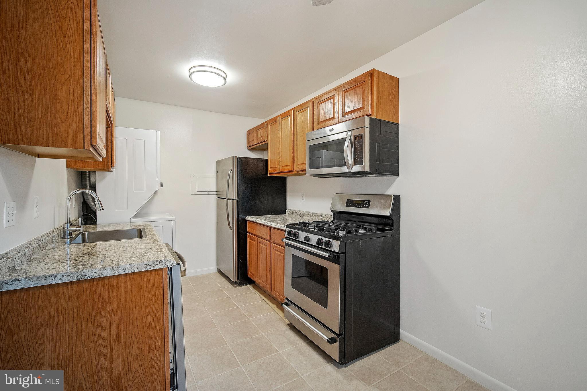 3350 Hewitt Avenue, Unit 101 Silver Spring, MD 20906 - Photo 9 of 21 New cabinets and counter