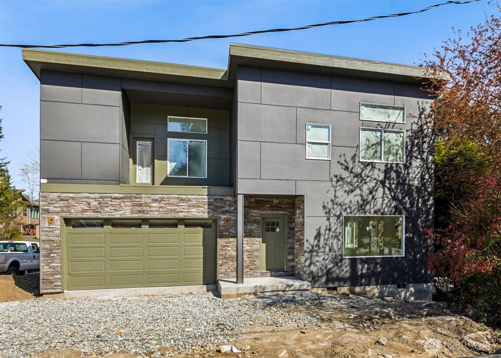 802 Southwest 132nd Street Burien, WA 98146 - Photo 1 of 10 a front view of a house with garden