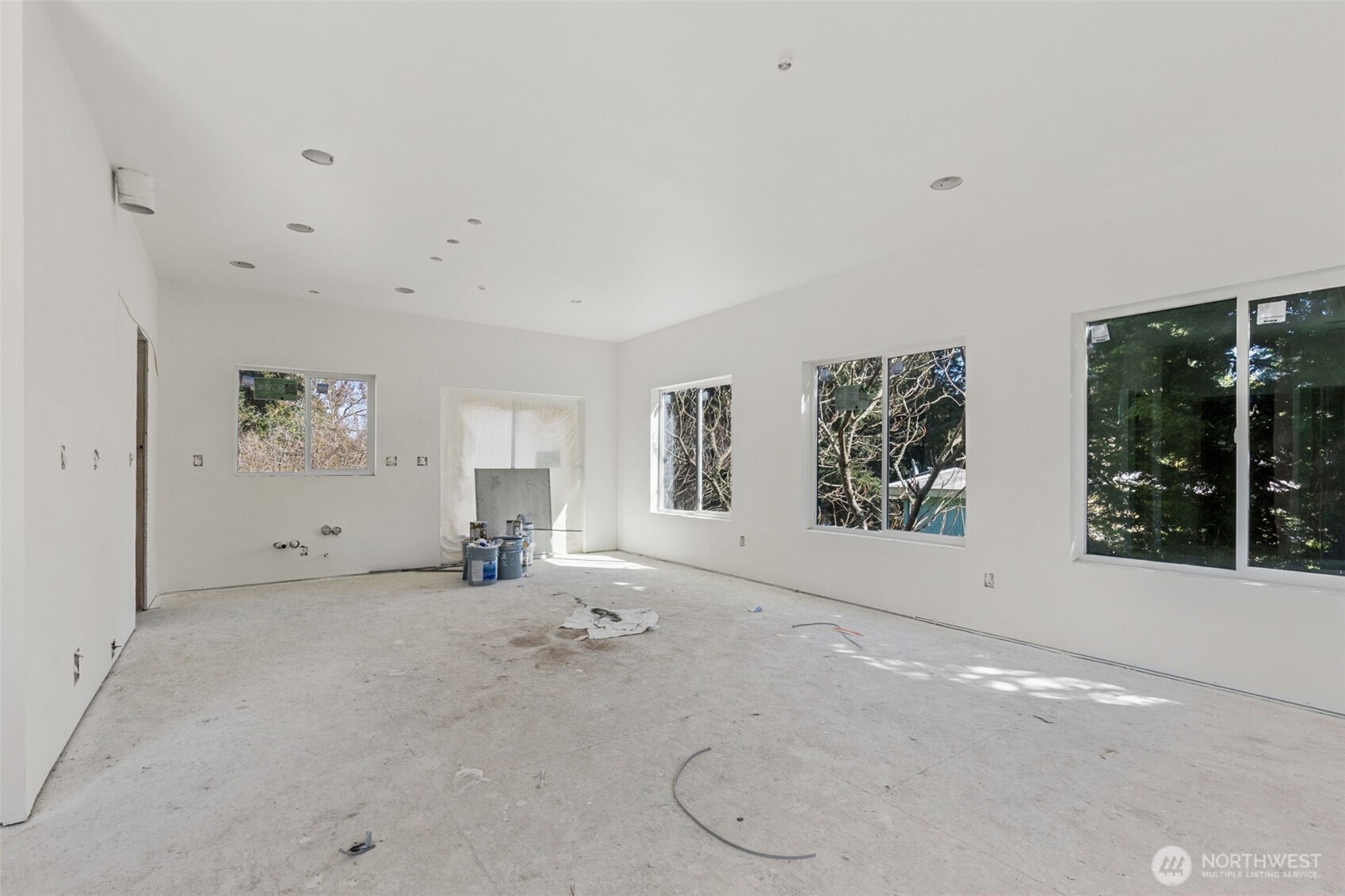 802 Southwest 132nd Street Burien, WA 98146 - Photo 3 of 10 a view of a big room with windows and cabinet