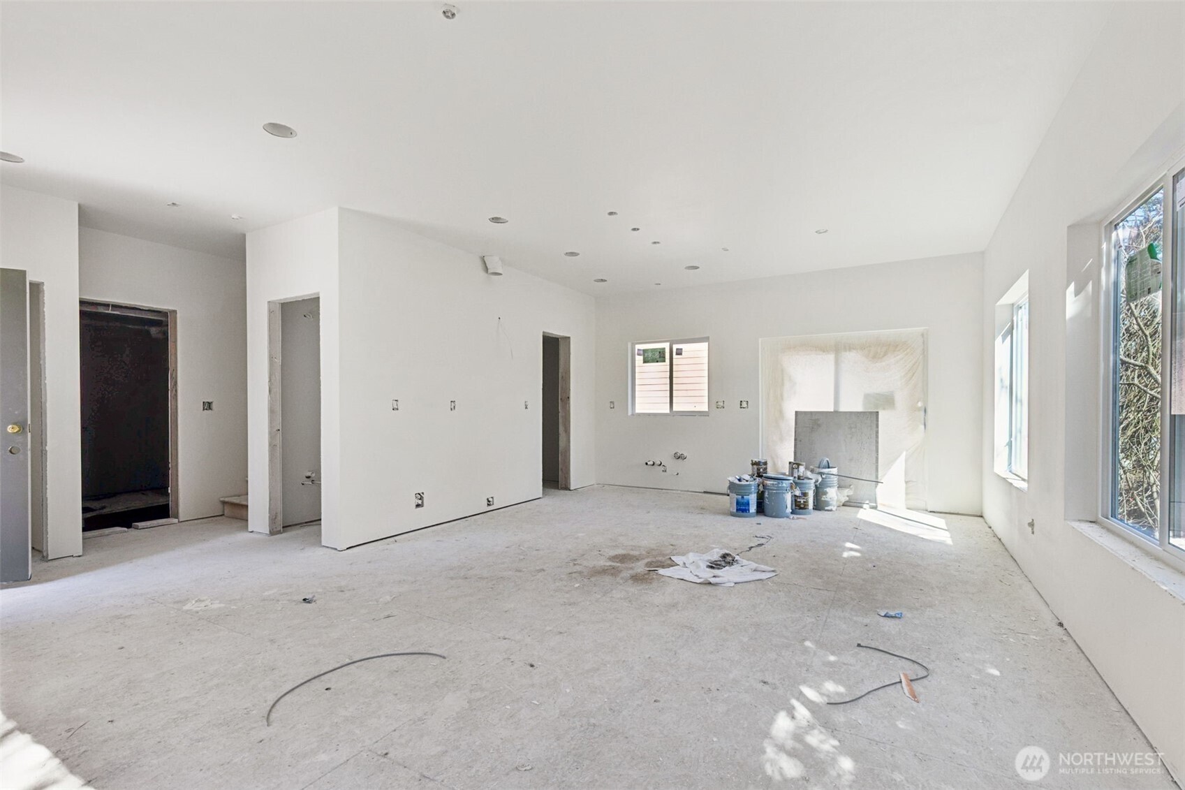 802 Southwest 132nd Street Burien, WA 98146 - Photo 4 of 10 a view of a livingroom with wooden floor and a window
