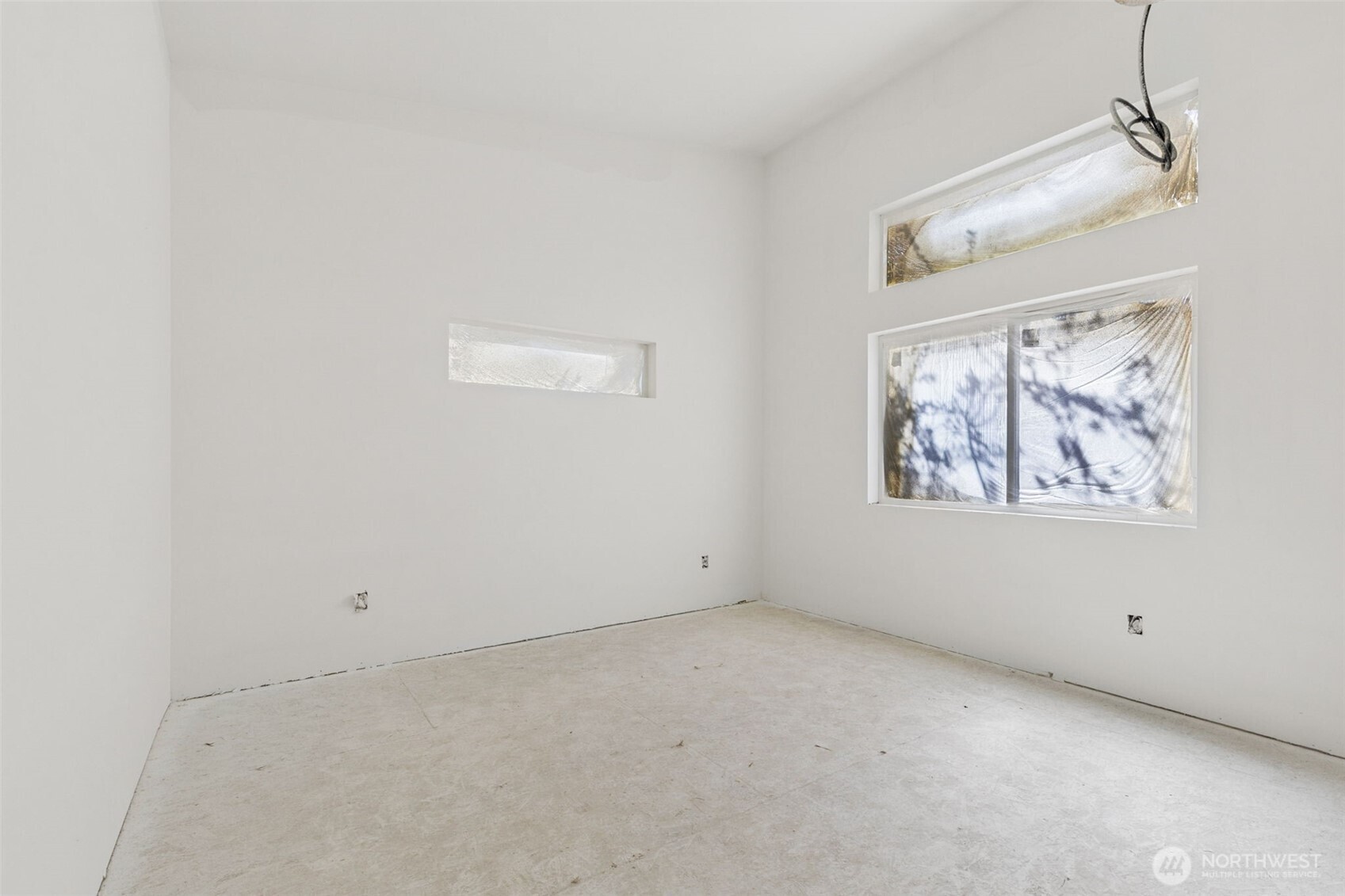 802 Southwest 132nd Street Burien, WA 98146 - Photo 5 of 10 an empty room with windows