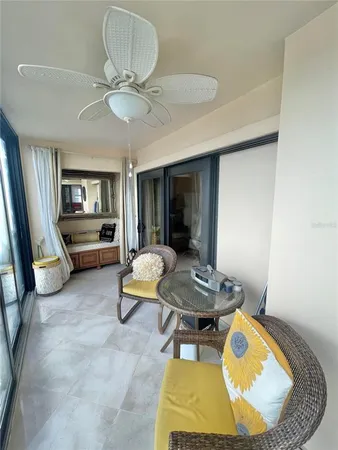 a room with furniture and a chandelier