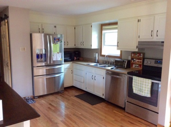 3161 Boston Road Wilbraham, MA 01095 - Photo 8 of 29 a kitchen with granite countertop a refrigerator stove and sink