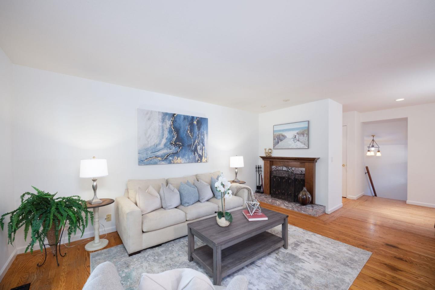 1204 Rainier Avenue Pacifica, CA 94044 - Photo 11 of 38 a living room with furniture and a fireplace