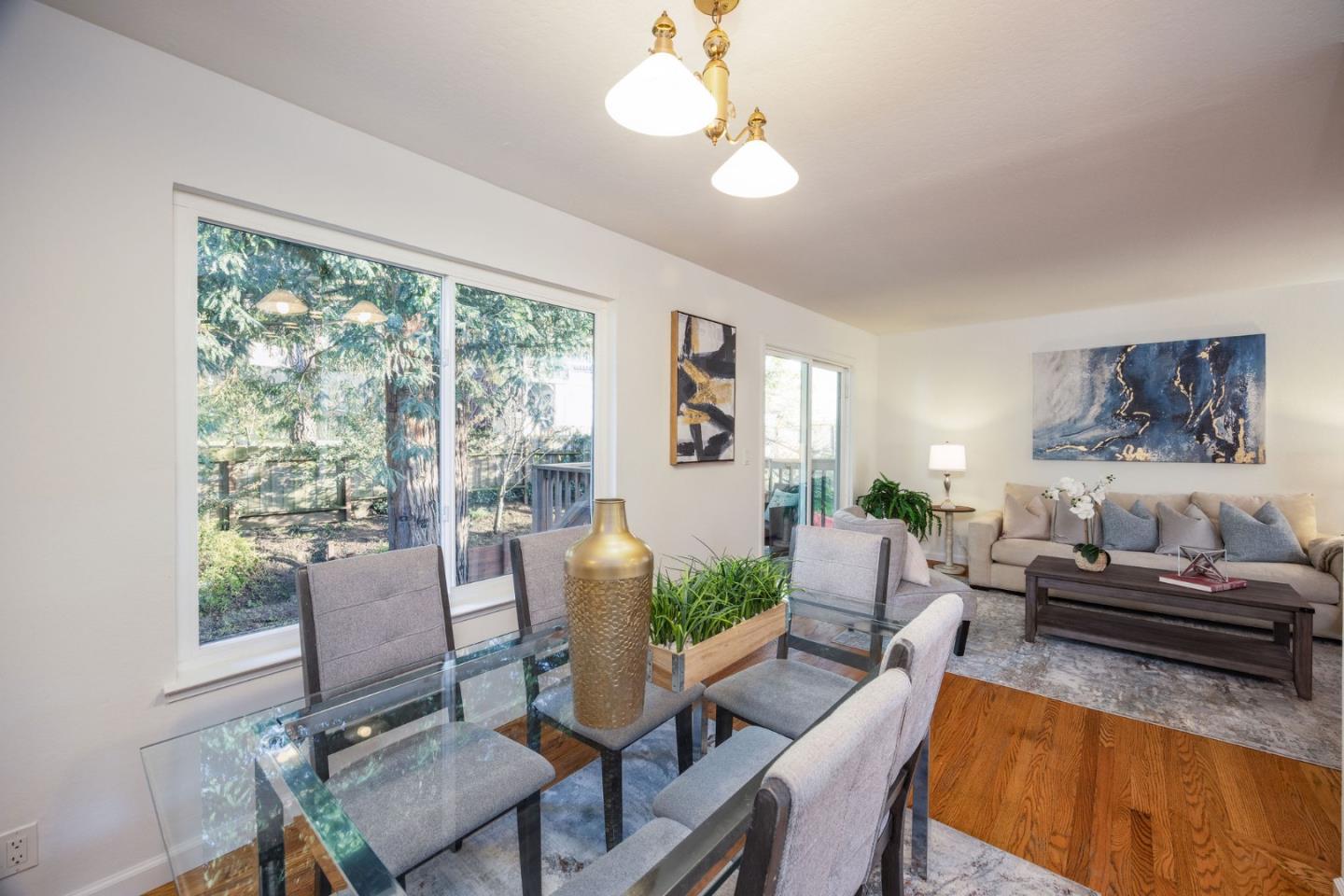 1204 Rainier Avenue Pacifica, CA 94044 - Photo 14 of 38 a living room with furniture and a large window