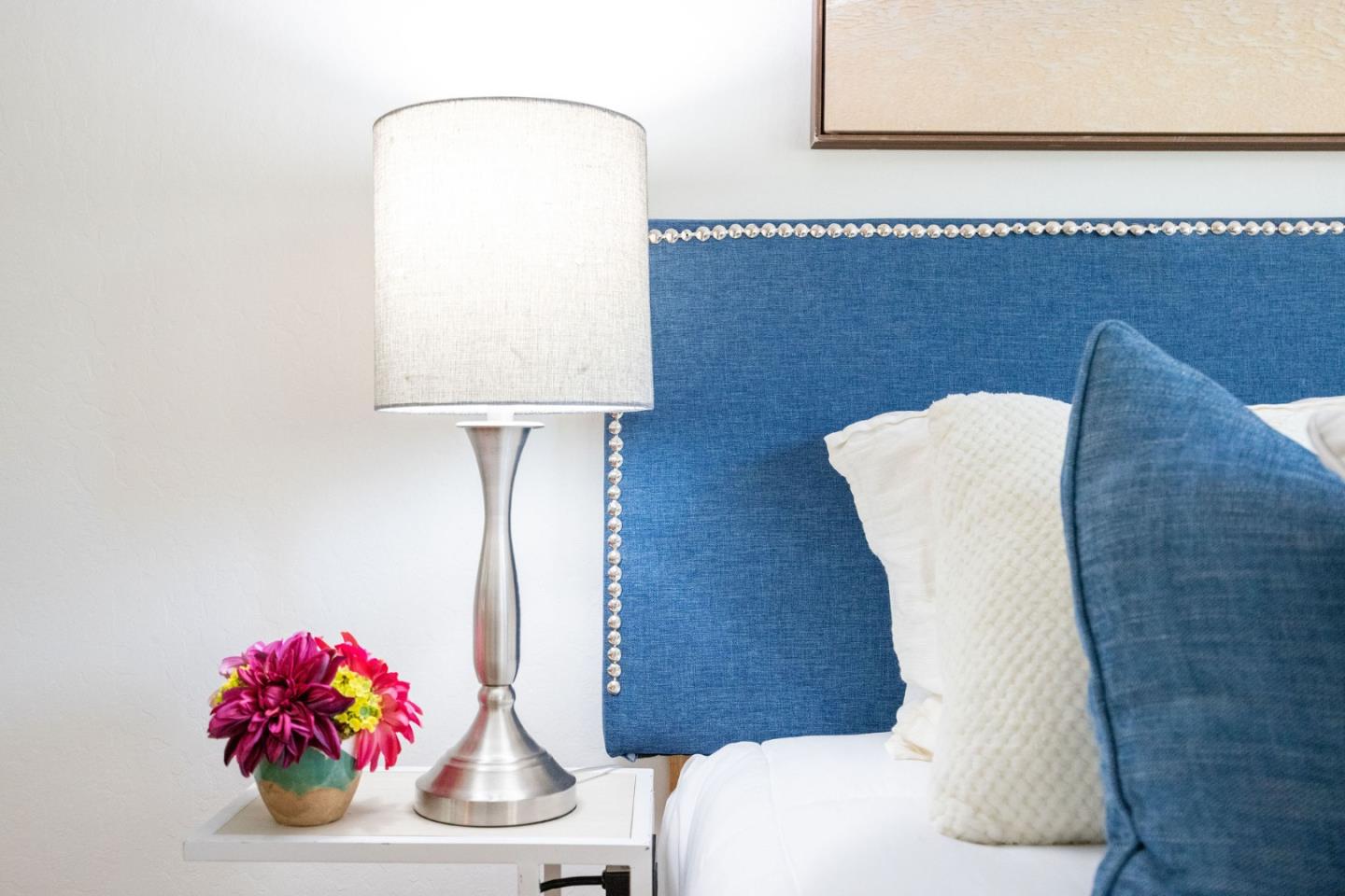 1204 Rainier Avenue Pacifica, CA 94044 - Photo 23 of 38 a vase of flowers sitting on a table