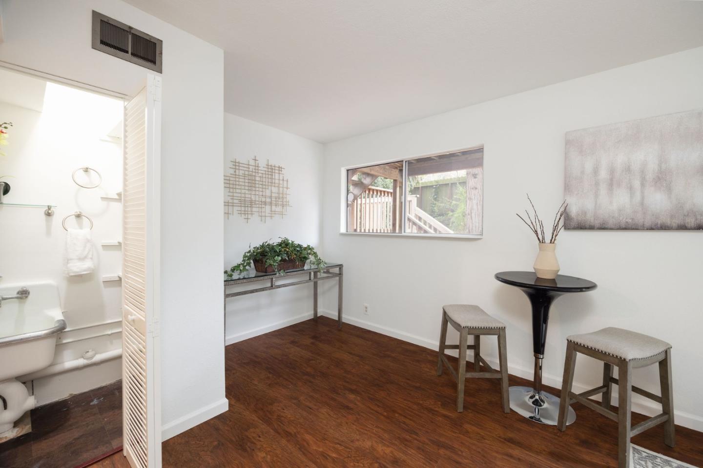 1204 Rainier Avenue Pacifica, CA 94044 - Photo 26 of 38 a room with furniture and a window