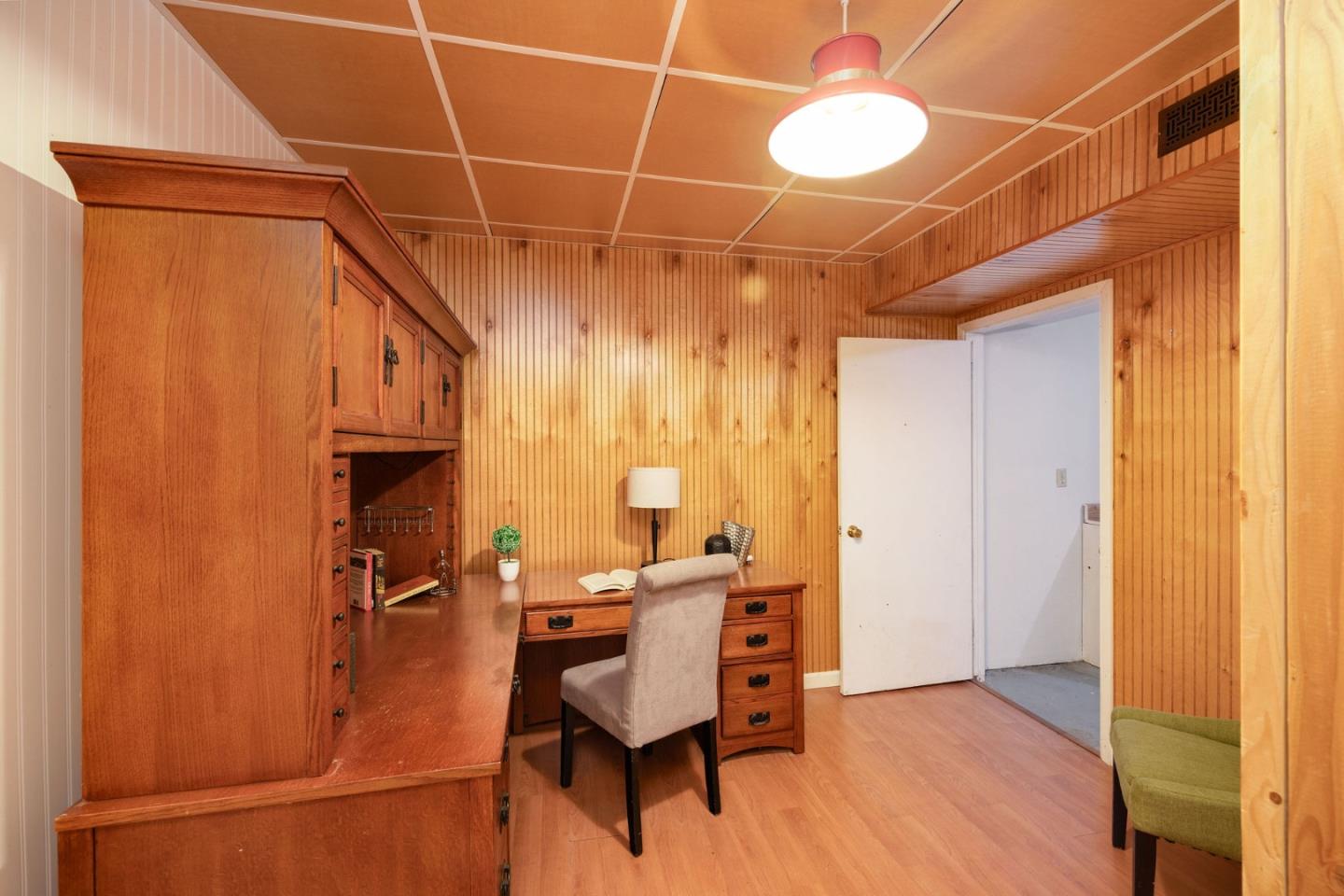 1204 Rainier Avenue Pacifica, CA 94044 - Photo 30 of 38 a view of a room with furniture and wooden floor