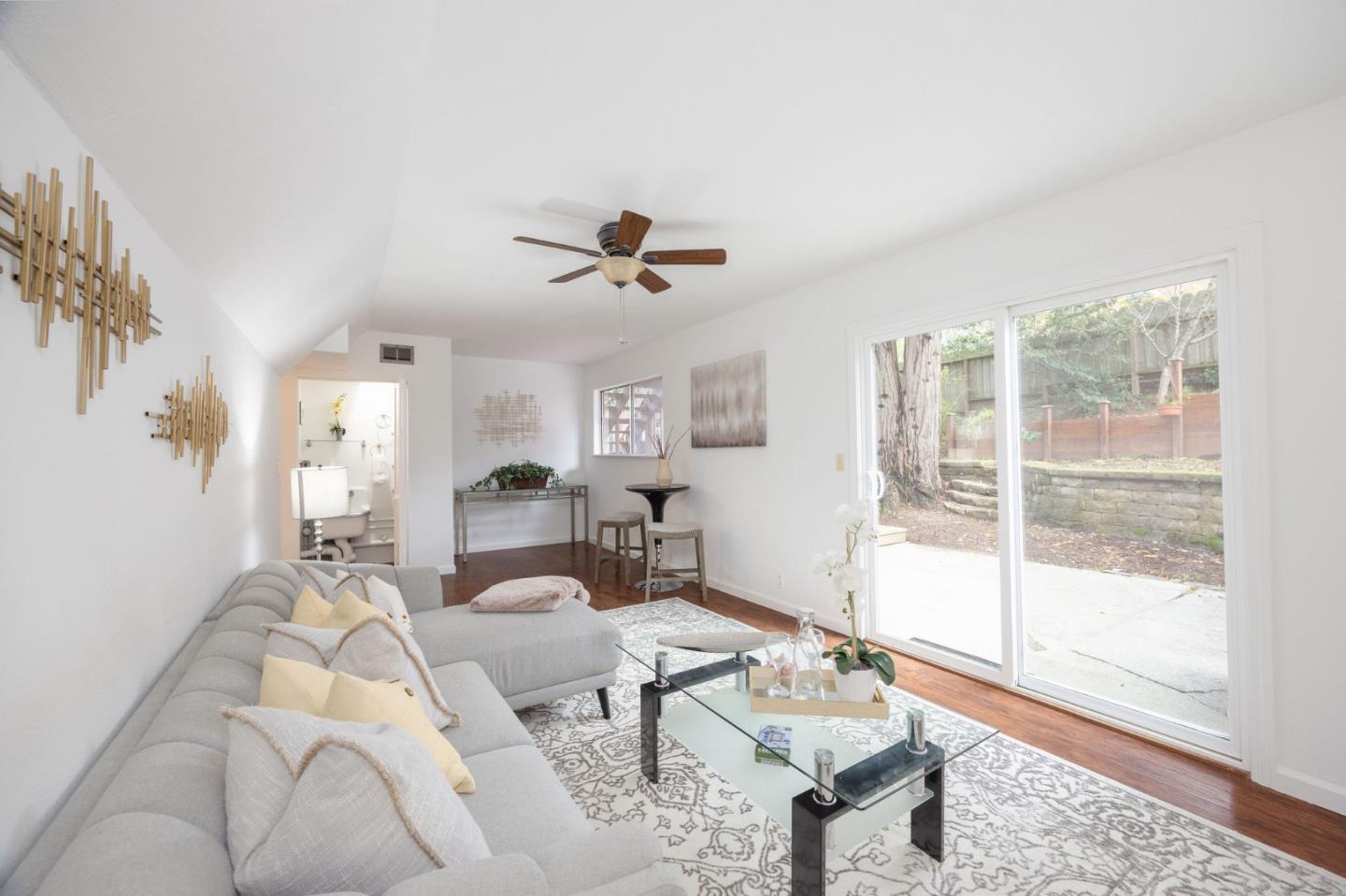 1204 Rainier Avenue Pacifica, CA 94044 - Photo 32 of 38 a living room with furniture and a window