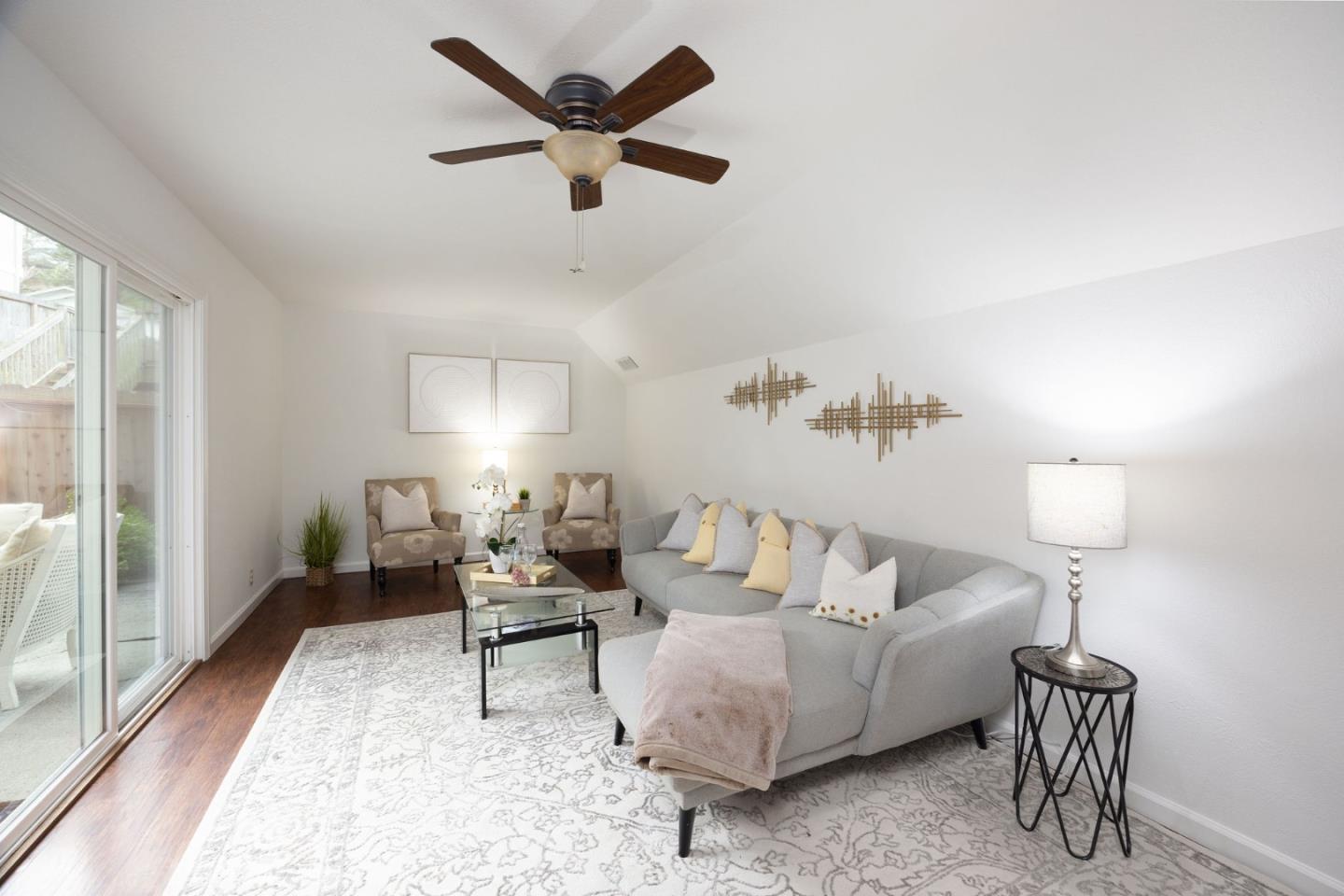 1204 Rainier Avenue Pacifica, CA 94044 - Photo 34 of 38 a living room with furniture and a large window