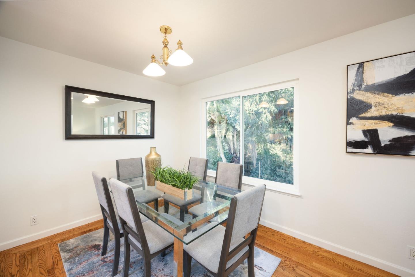1204 Rainier Avenue Pacifica, CA 94044 - Photo 10 of 38 a view of a dining room with furniture window and outside view