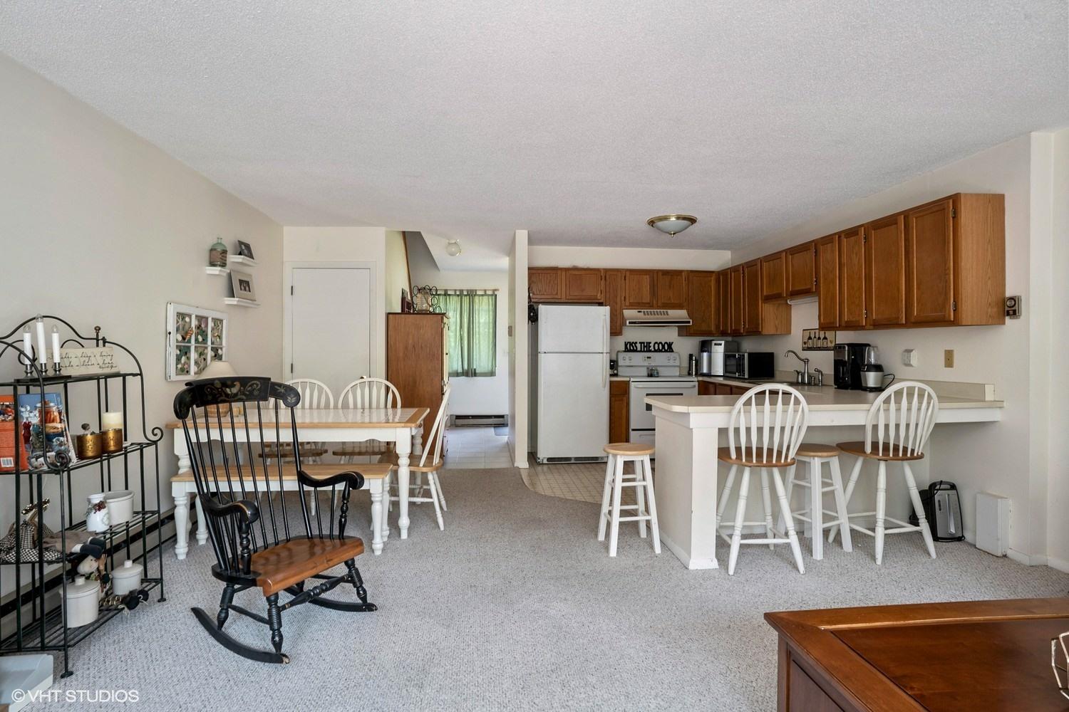 67 Round House Road Bourne, MA 02532 - Photo 6 of 15 a view of kitchen and dining area with furniture