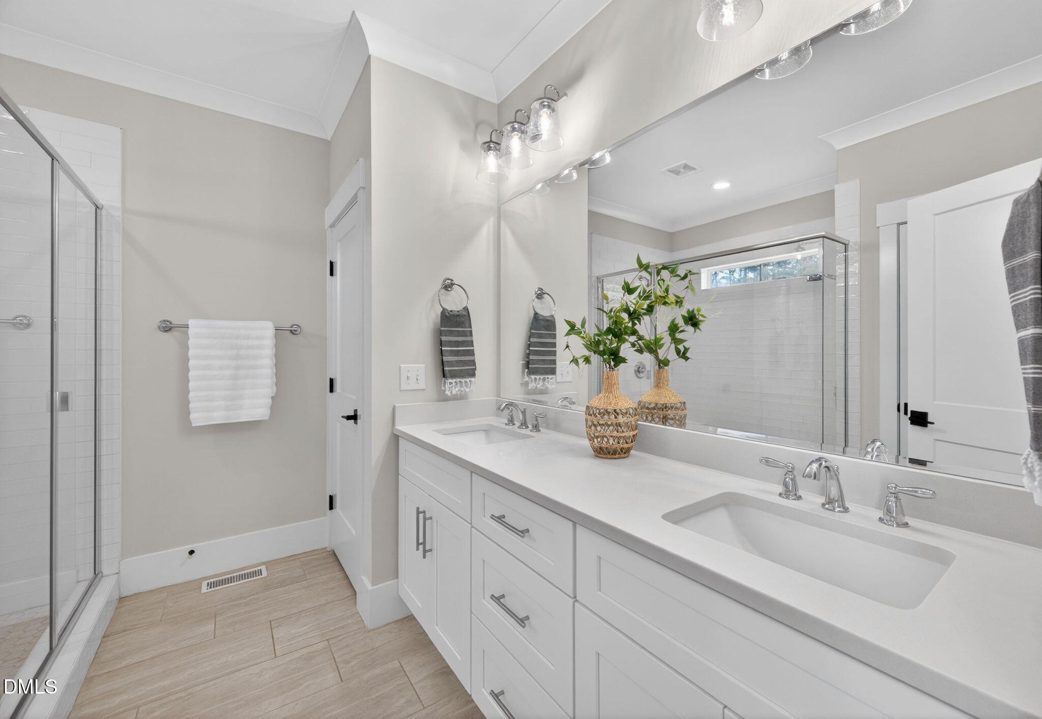 5221 Stream Bank Court Raleigh, NC 27603 - Photo 20 of 31 29_29-5221-stream-bank-ct-primary-bathro