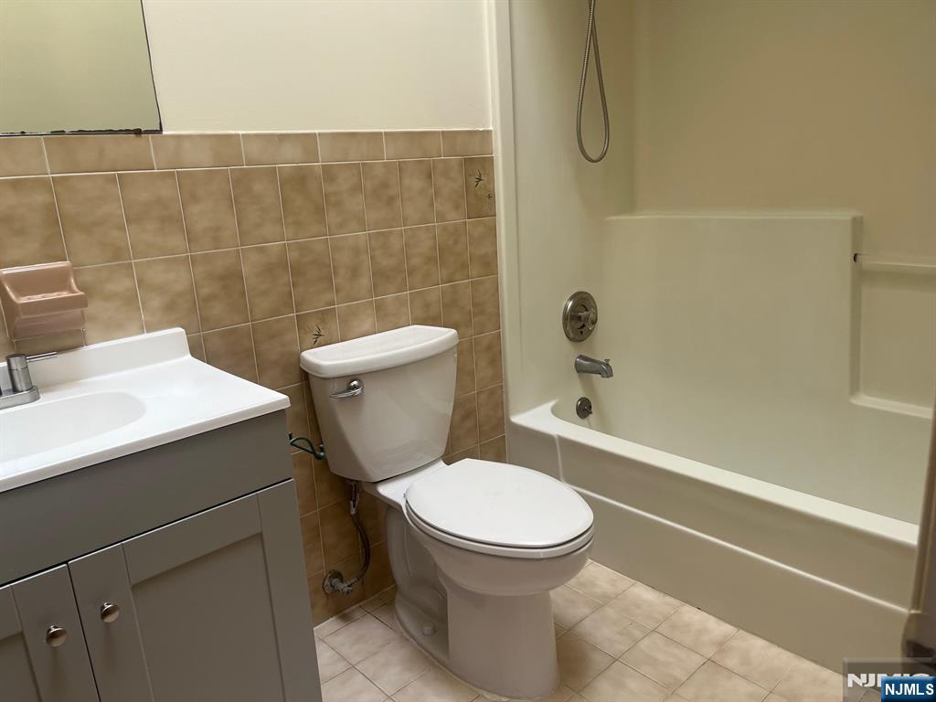 635 B Ridge Road, Unit B Lyndhurst, NJ 07071 - Photo 14 of 16 a bathroom with a toilet and a shower