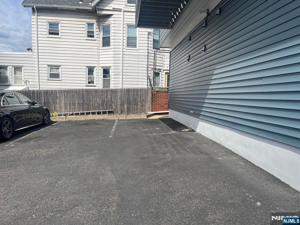 635 B Ridge Road, Unit B Lyndhurst, NJ 07071 - Photo 16 of 16 a view of a house with a parking space