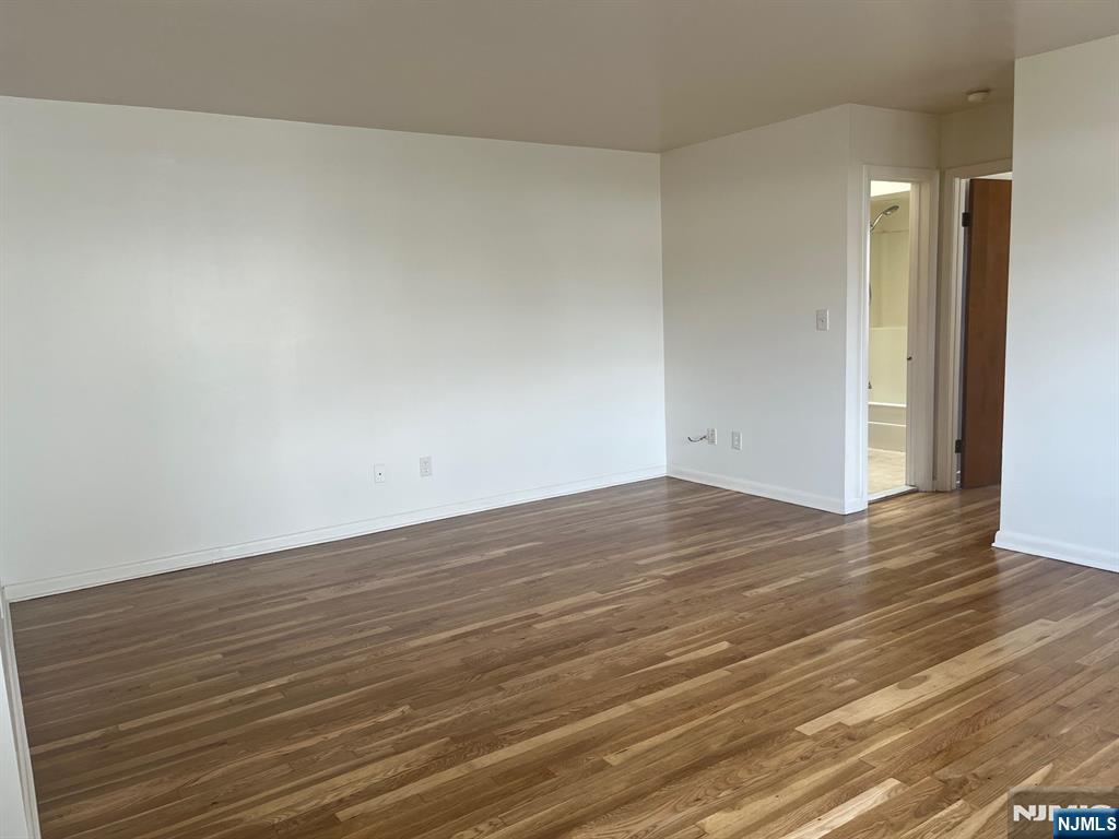 635 B Ridge Road, Unit B Lyndhurst, NJ 07071 - Photo 4 of 16 a view of empty room with wooden floor