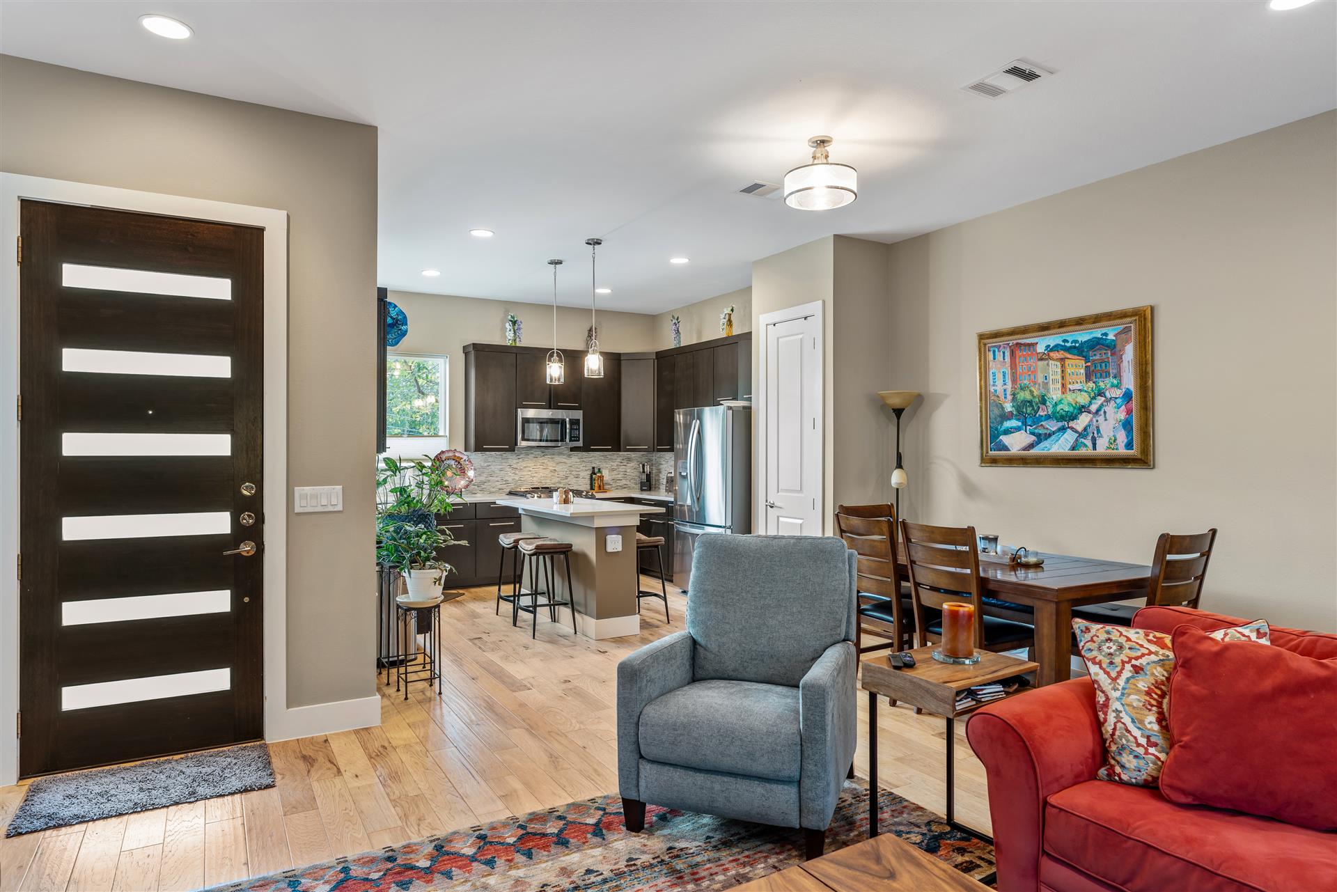 The open-concept main level is thoughtfully designed for effortless everyday living and seamless entertaining.