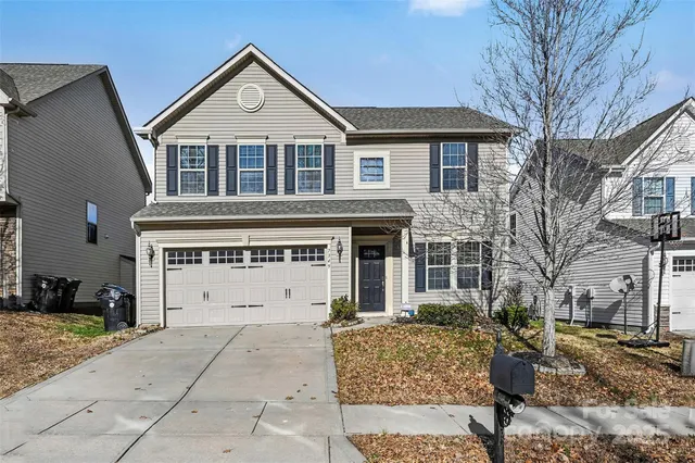 a bathroom with a sink a mirror and a shower
