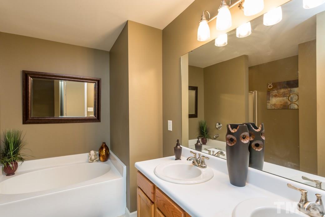 4130 Springfield Creek Drive Raleigh, NC 27616 - Photo 6 of 12 Relax after a hard days work in the master bath!!