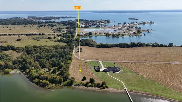 a view of an ocean with a mountain