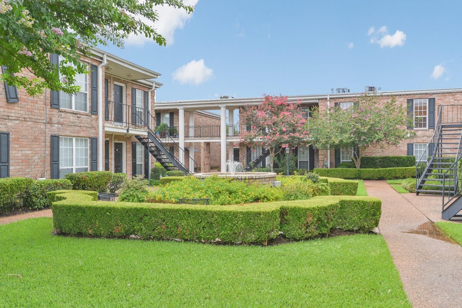 6402 Del Monte Drive, Unit 45 Houston, TX 77057 - Photo 18 of 20 a house view with a garden space