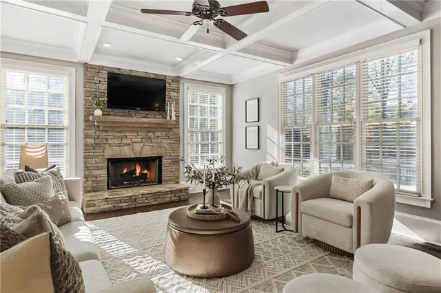 a spacious bedroom with a bed and a table in it