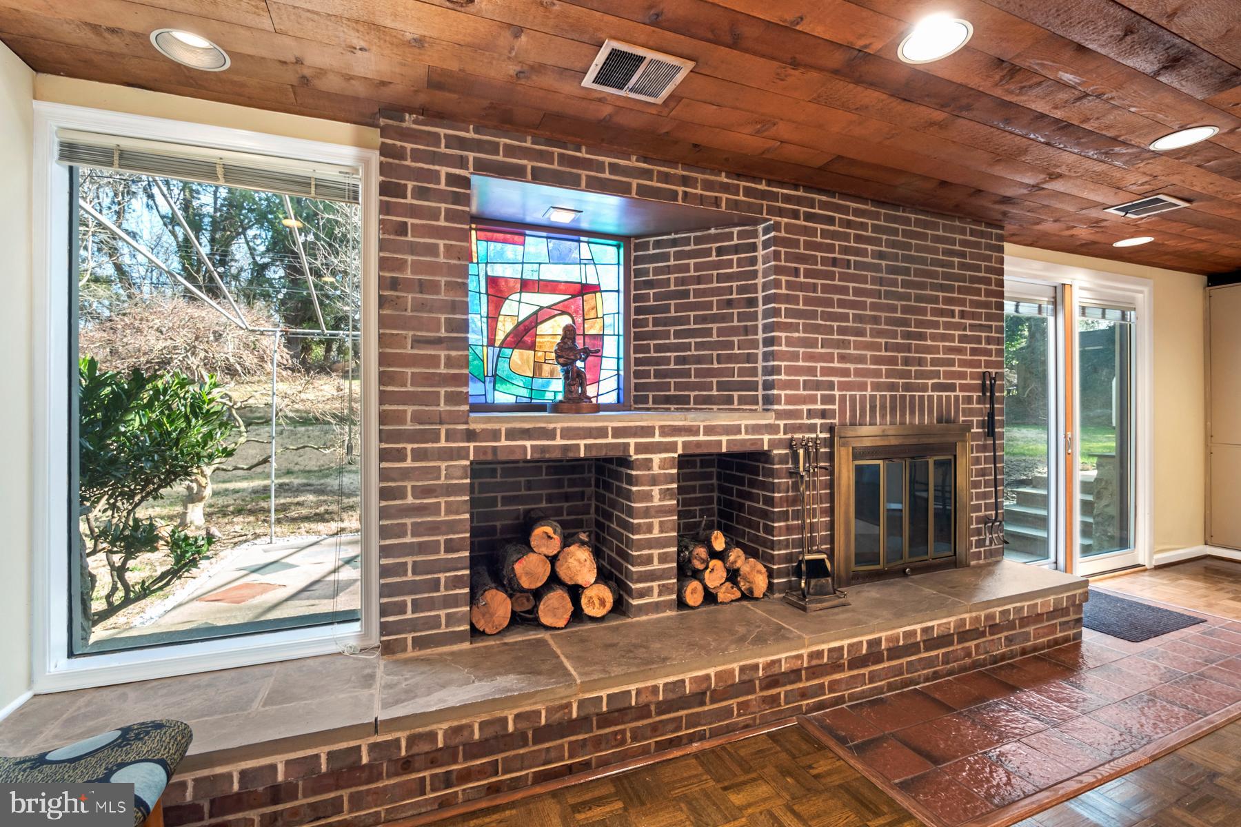 1012 Arboretum Road Wyncote, PA 19095 - Photo 17 of 41 Lower Level Lounge Wood Burning Fireplace