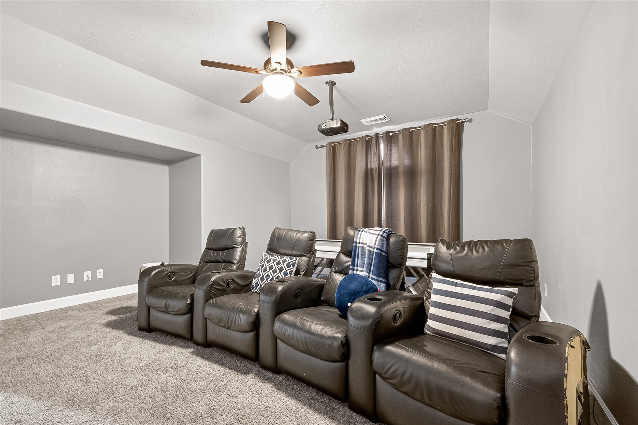7415 Riven Oaks Court Cypress, TX 77433 - Photo 30 of 42 Another view of the expansive upstairs game room highlights the versatile open layout, ideal for a media room, playroom, home gym, or additional living space.