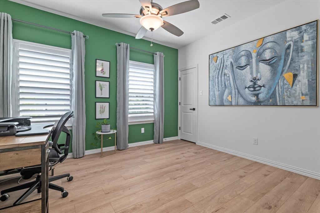 1561 William Way Dallas, TX 75234 - Photo 25 of 38 a view of a livingroom with workspace and a window