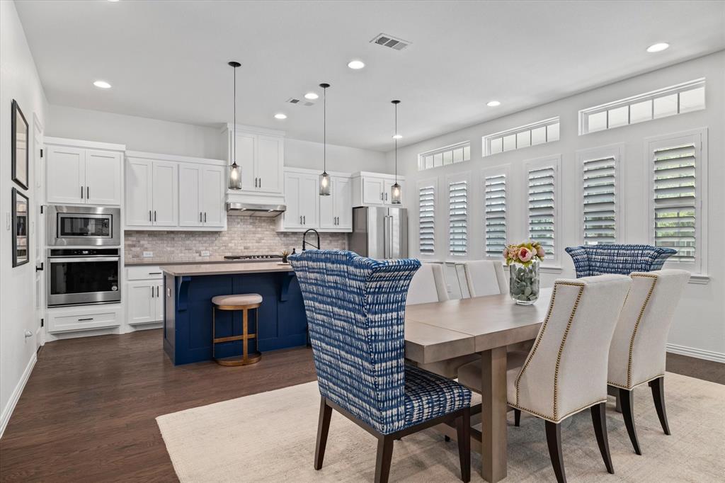 1561 William Way Dallas, TX 75234 - Photo 8 of 38 a view of a dining room with furniture