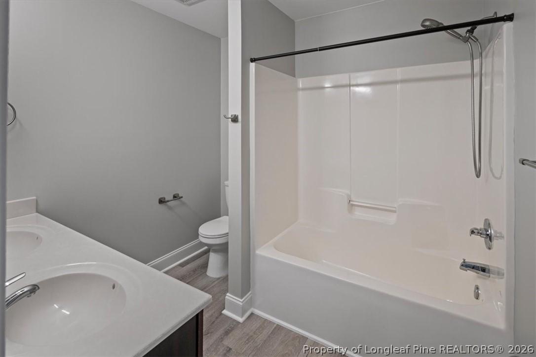 134 Huzzas Circle Cameron, NC 28326 - Photo 12 of 31 a bathroom with a bathtub and a shower