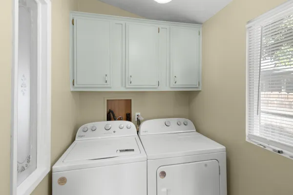 a utility room with dryer and washer