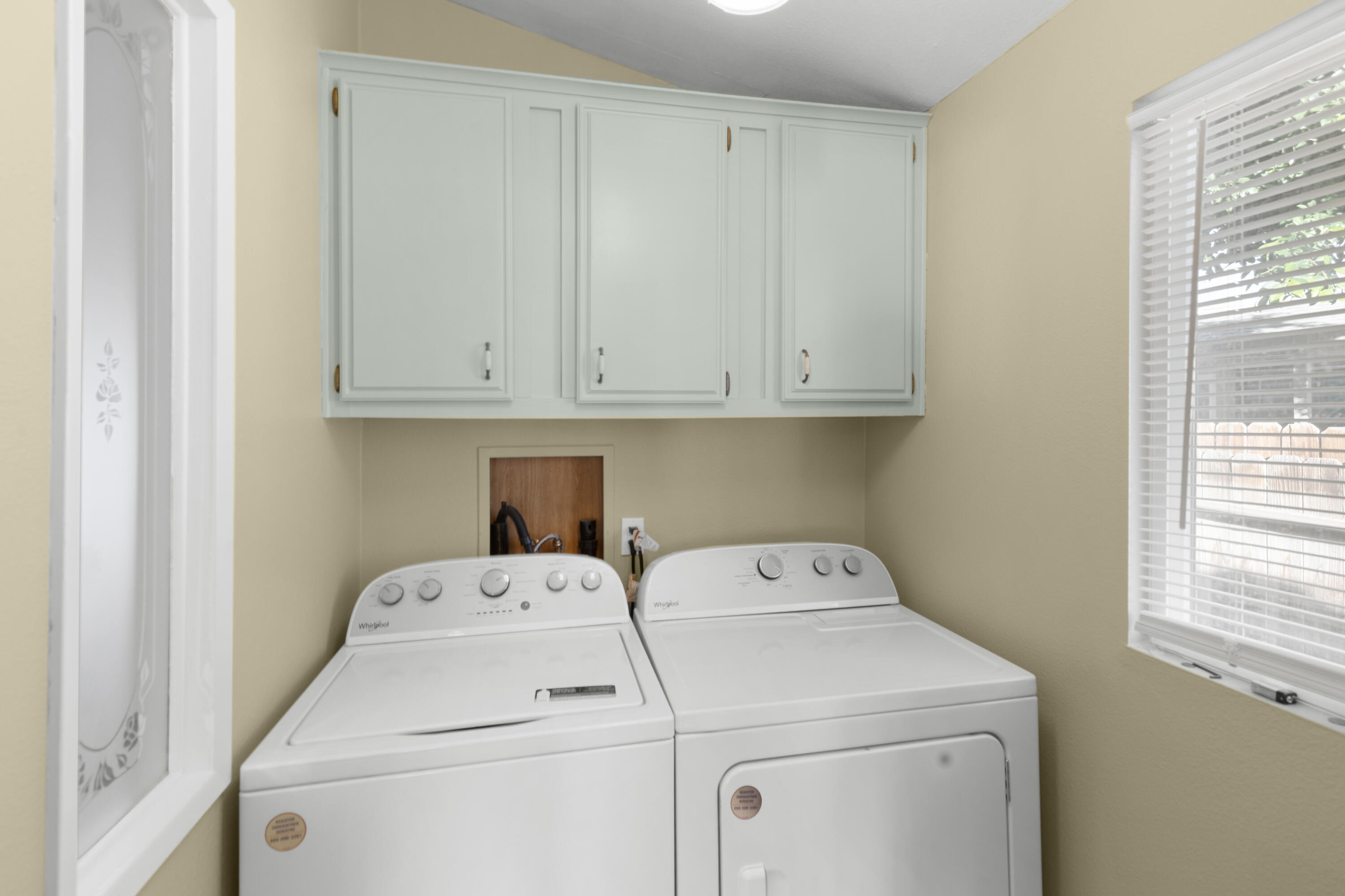 47800 Madison Street, Unit 44 Indio, CA 92201 - Photo 19 of 25 a utility room with dryer and washer