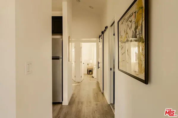a view of a bathroom from the hallway
