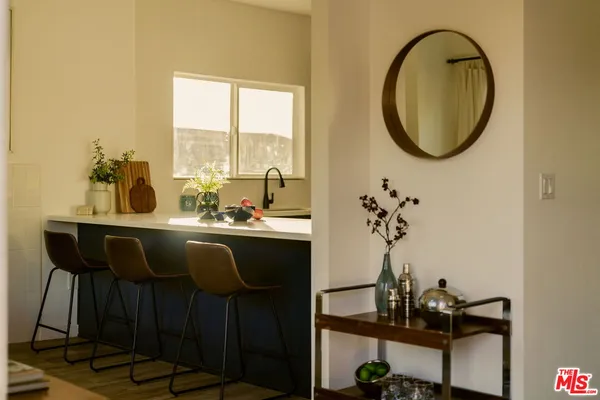 a dining room with table and chairs