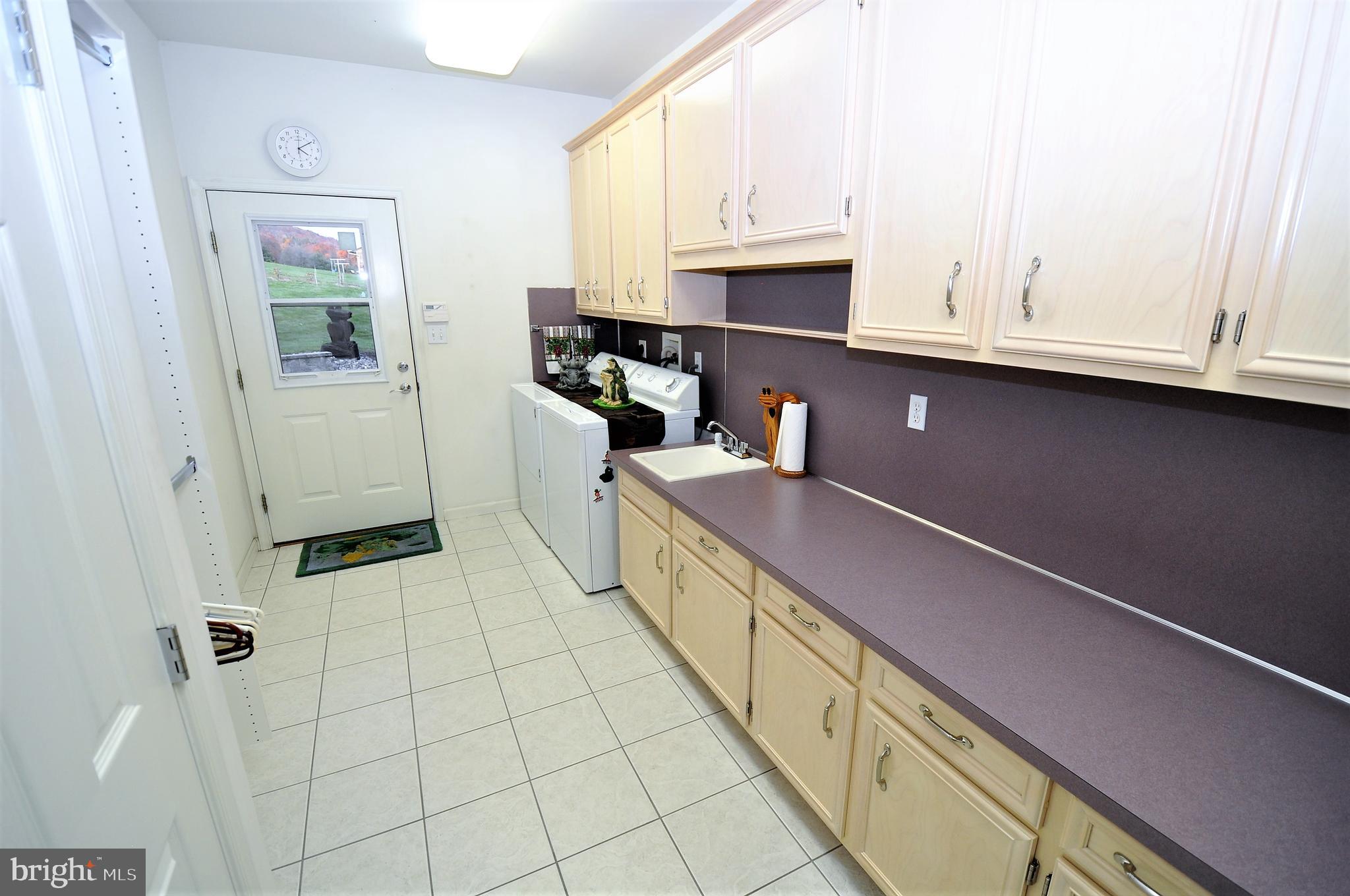 145 Mountain Road Tamaqua, PA 18252 - Photo 38 of 66 Laundry Room w/ built-ins and slop sink