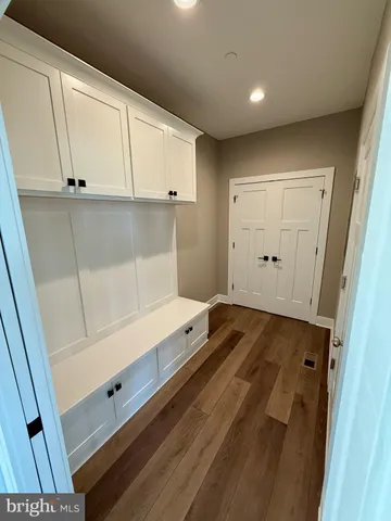 a bathroom with a bathtub and a sink