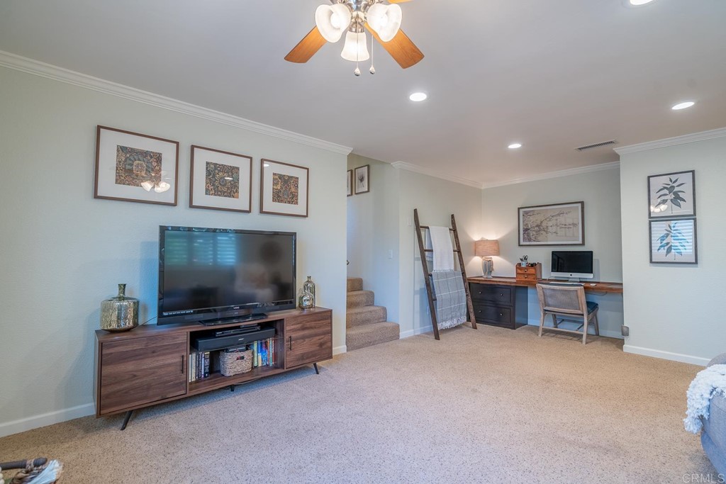 11493 Eucalyptus Hills Drive Lakeside, CA 92040 - Photo 12 of 30 a living room with furniture and a flat screen tv