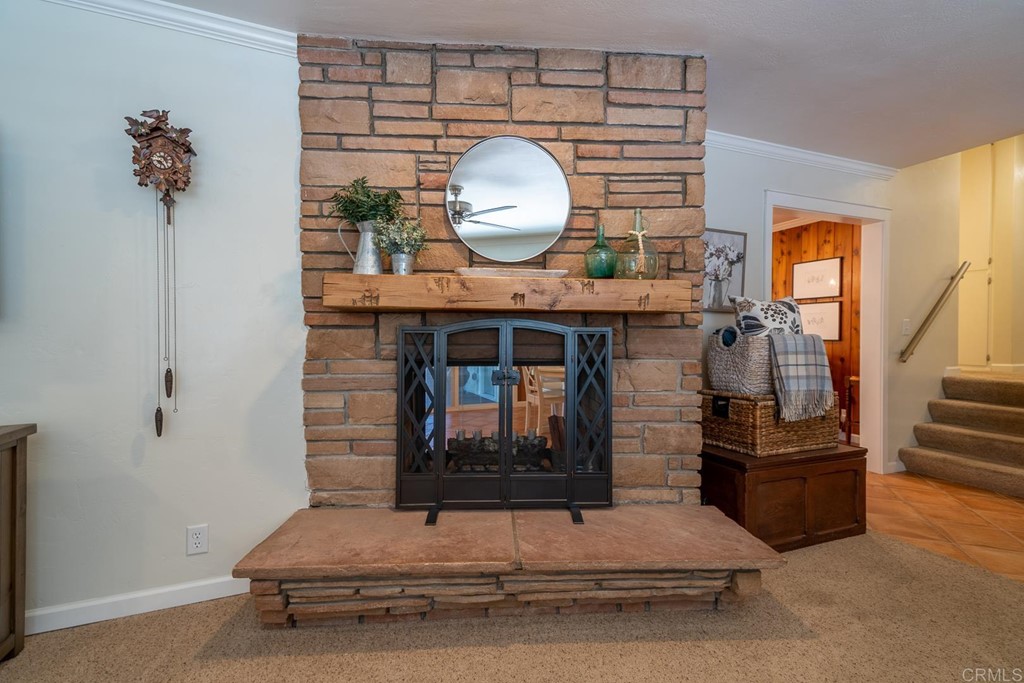 11493 Eucalyptus Hills Drive Lakeside, CA 92040 - Photo 16 of 30 a living room with furniture and a fireplace