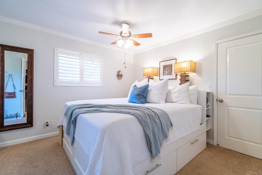 11493 Eucalyptus Hills Drive Lakeside, CA 92040 - Photo 18 of 30 a bedroom with a bed and window