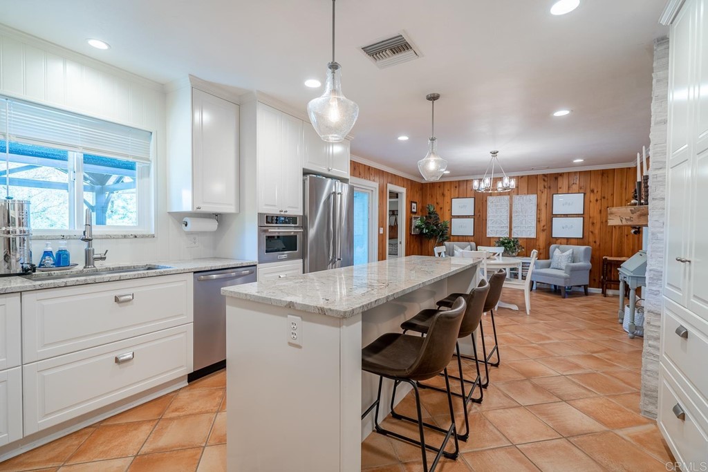 11493 Eucalyptus Hills Drive Lakeside, CA 92040 - Photo 8 of 30 a kitchen with counter space cabinets and appliances