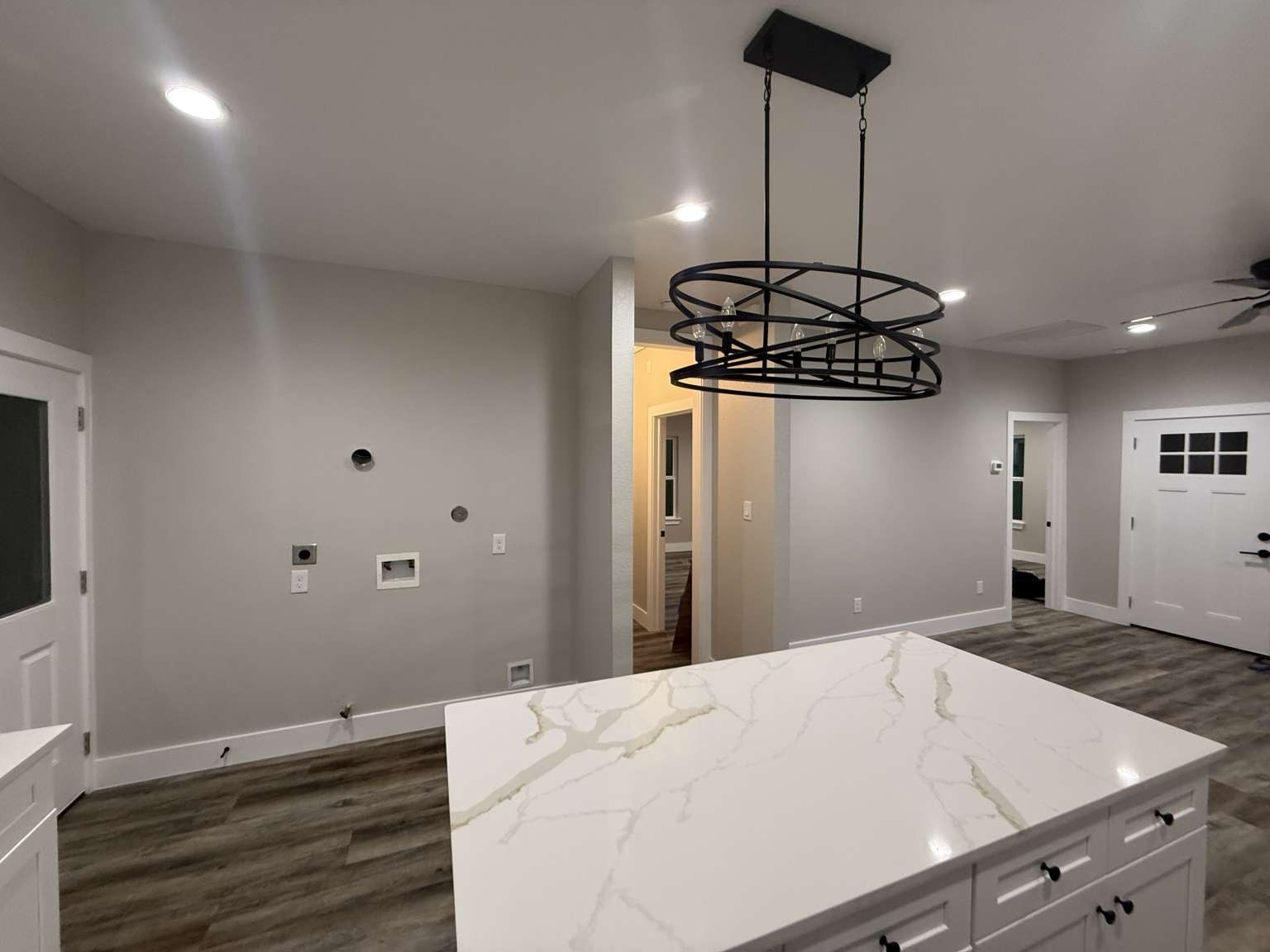 1620 Sam Wilson Street Houston, TX 77020 - Photo 21 of 40 a bedroom with a bed and a chandelier