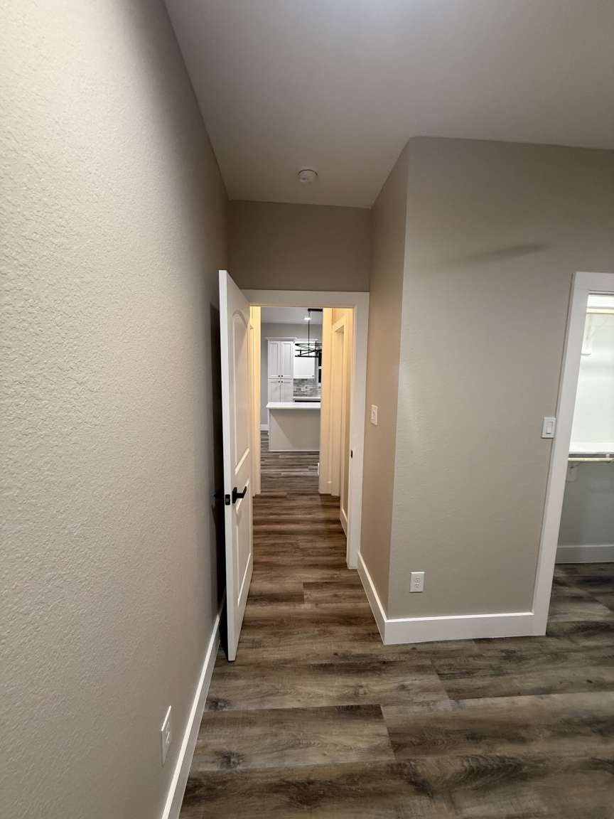 1620 Sam Wilson Street Houston, TX 77020 - Photo 29 of 40 a view of a hallway view with wooden floor and staircase
