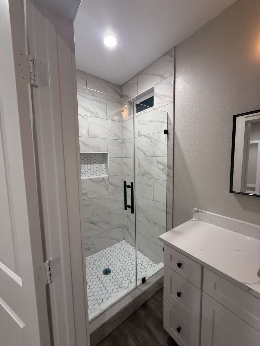 1620 Sam Wilson Street Houston, TX 77020 - Photo 31 of 40 a bathroom with a shower and a sink