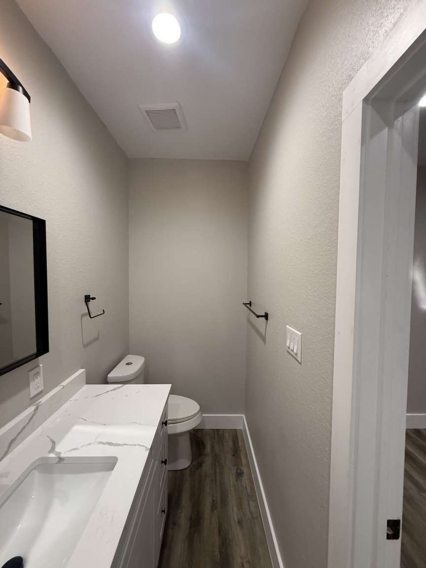 1620 Sam Wilson Street Houston, TX 77020 - Photo 32 of 40 a bathroom with a sink and a toilet