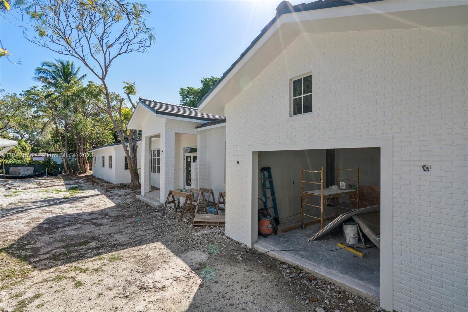 6230 Southwest 60th Street Miami, FL 33143 - Photo 13 of 57 a view of a house with backyard
