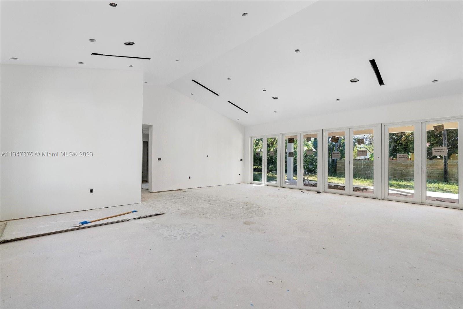 6230 Southwest 60th Street Miami, FL 33143 - Photo 14 of 57 a view of an empty room with a window