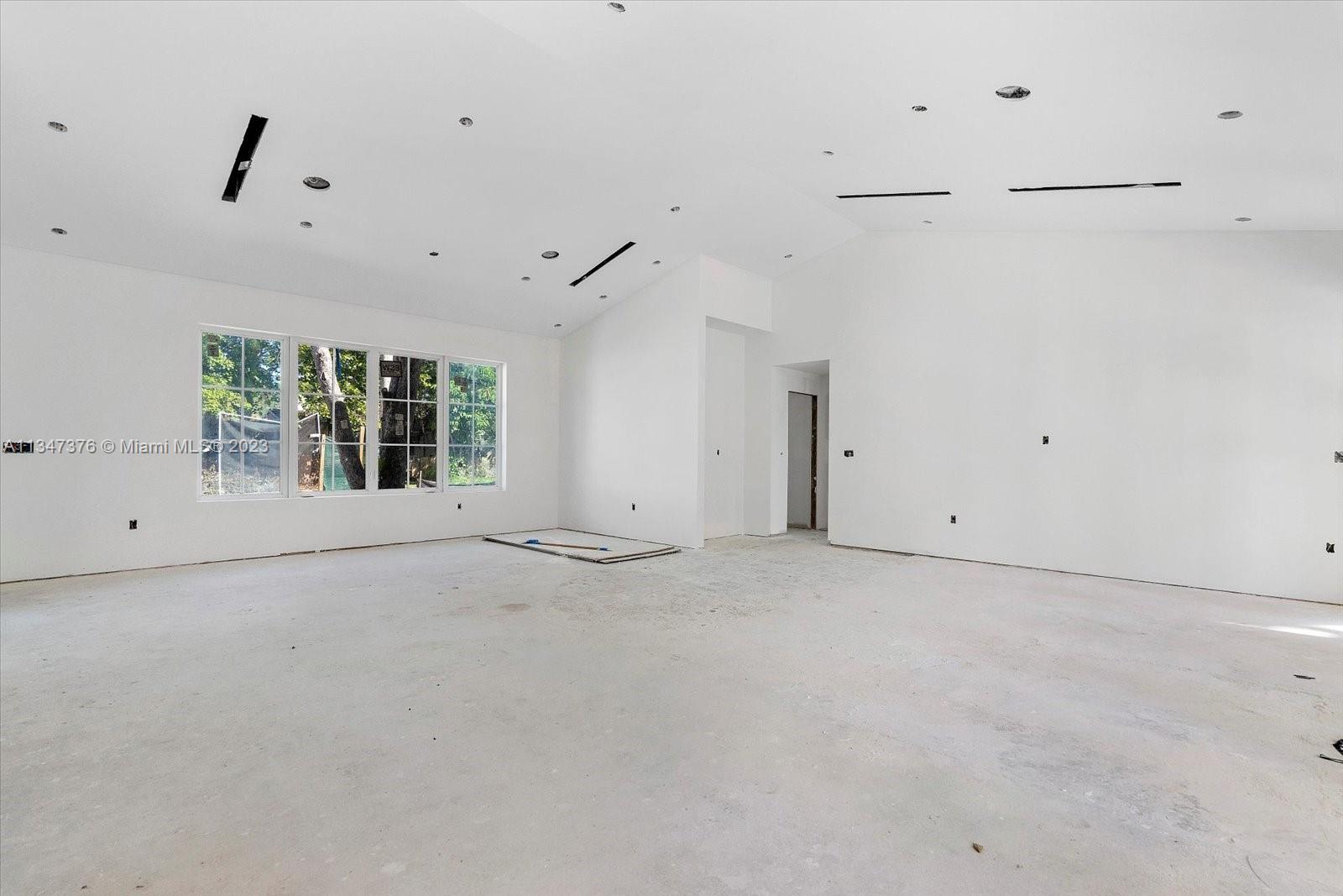 6230 Southwest 60th Street Miami, FL 33143 - Photo 19 of 57 a view of an empty room with a window