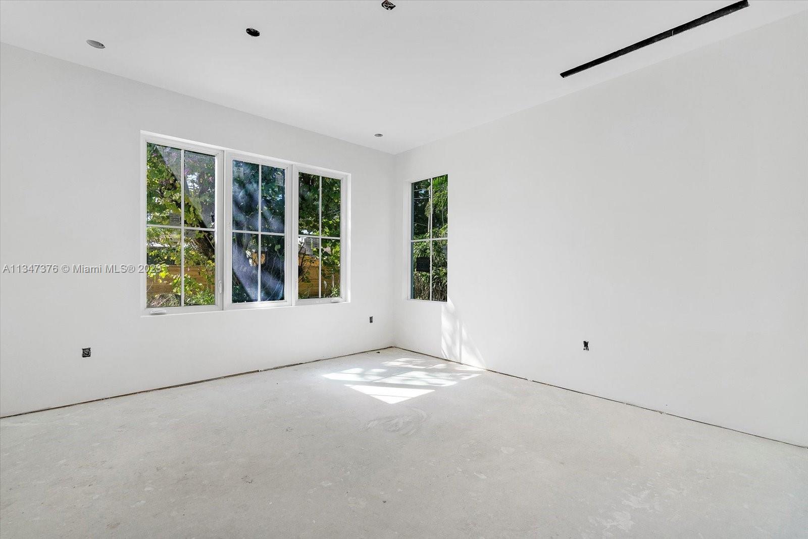 6230 Southwest 60th Street Miami, FL 33143 - Photo 22 of 57 a view of an empty room with a window