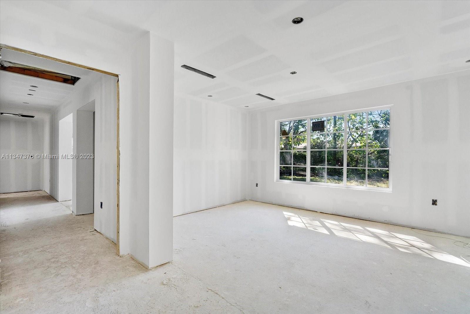 6230 Southwest 60th Street Miami, FL 33143 - Photo 32 of 57 a view of an empty room with a window